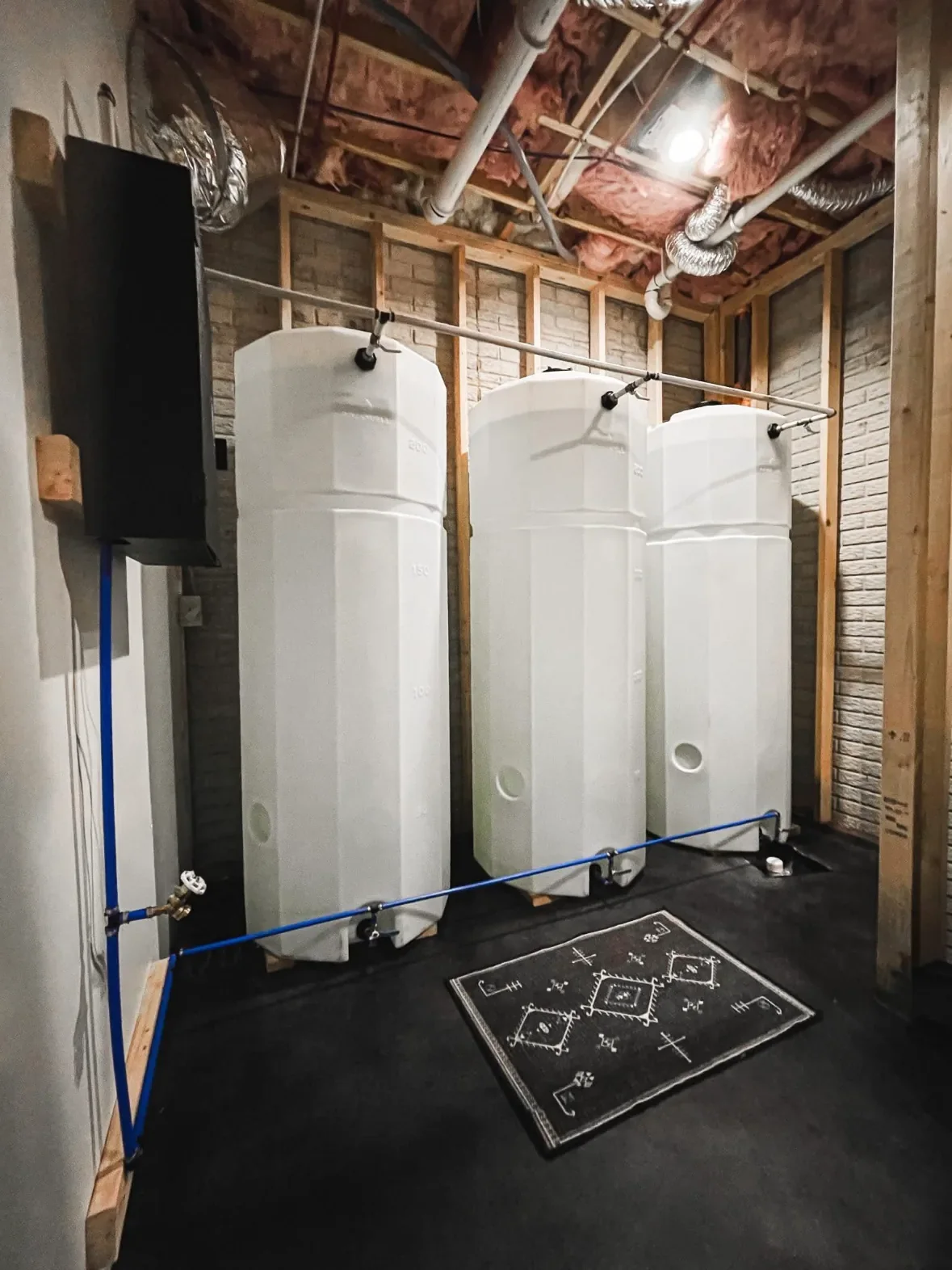 Large-scale water treatment system installation by The Village Plumber in North Georgia